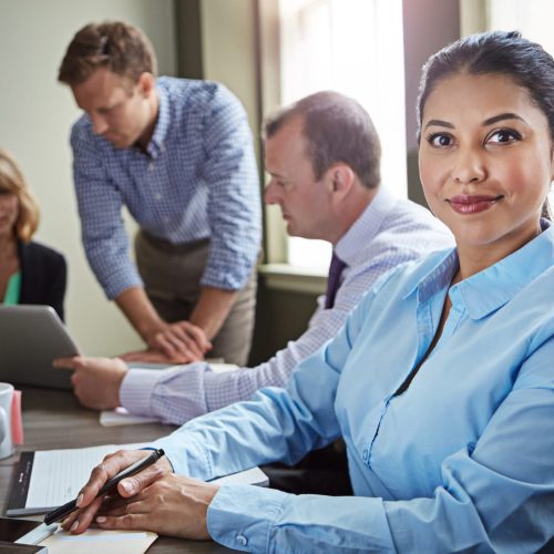 confidence-smile-business-woman-meeting-accounting-about-us-finance-career-portrait-happy-professional-auditor-office-investment-bookkeeping-coworking-with-team (1)